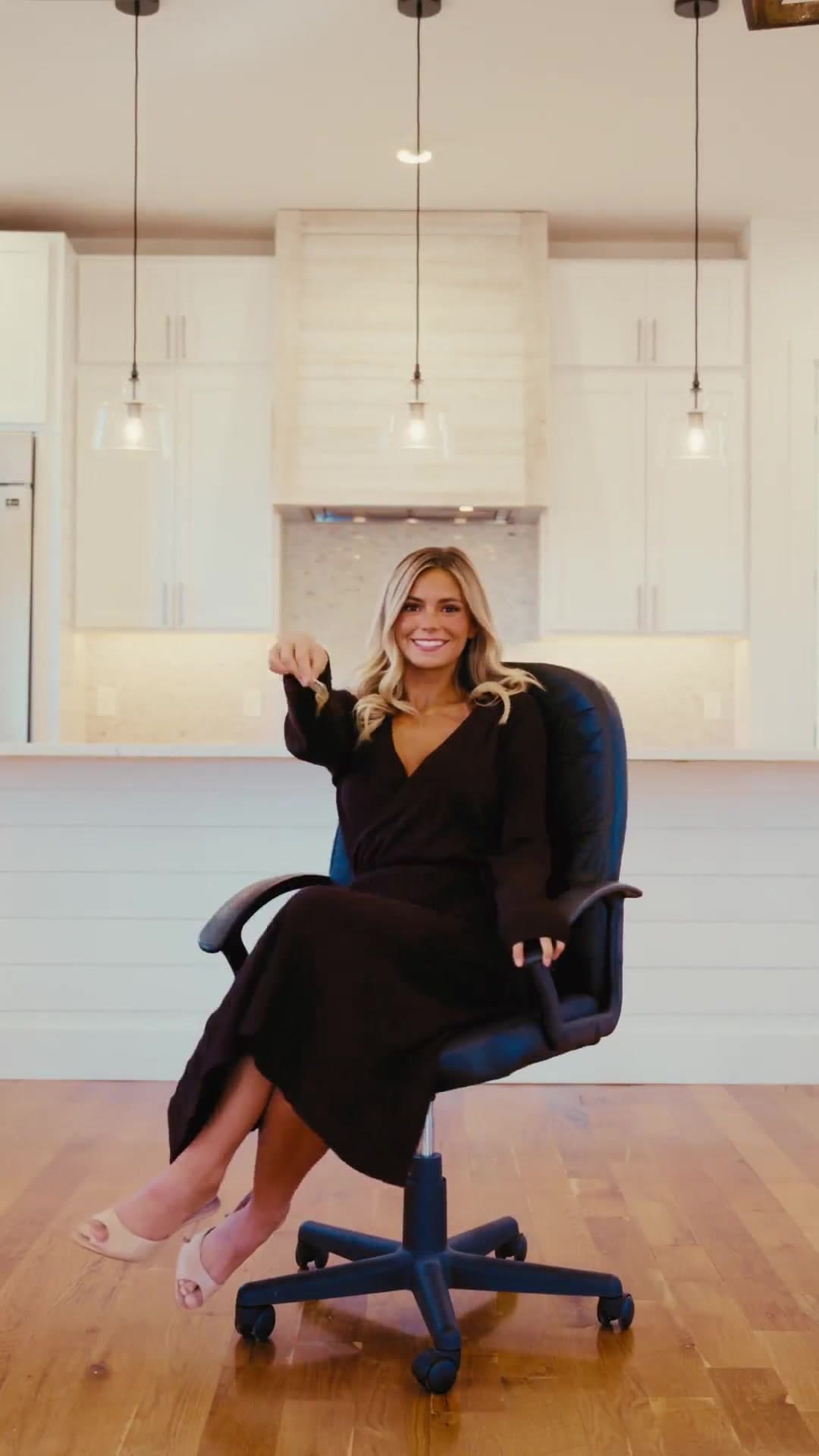 Trinity Covington smiling with keys in a bright Tuscaloosa-area home.